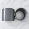 Socket PVC 3 Inch Pralon tampak samping dan atas menunjukkan ukuran 3 inch dan merek Pralon di latar marmer